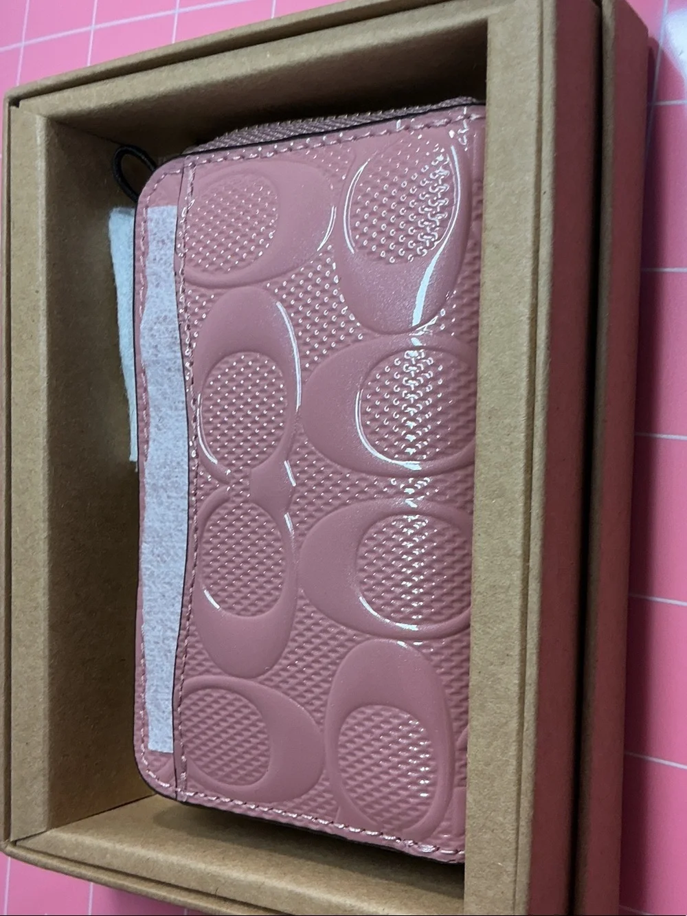 Coach patent zip around card case
